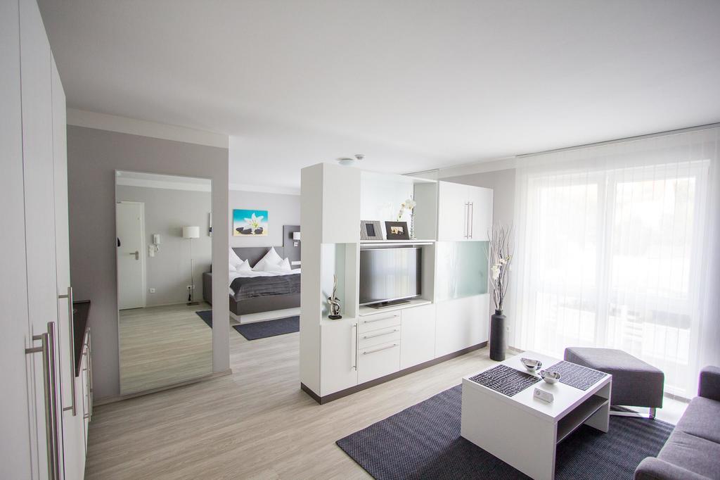 Aparthotel "Am Fliess" Hoyerswerda Quarto foto