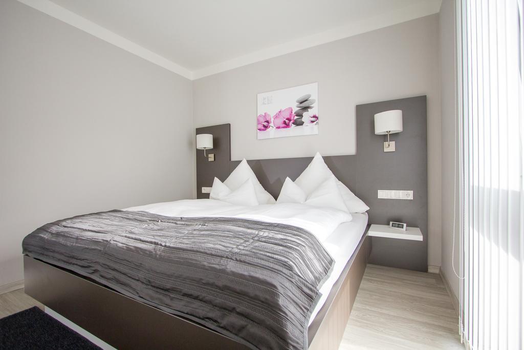 Aparthotel "Am Fliess" Hoyerswerda Quarto foto
